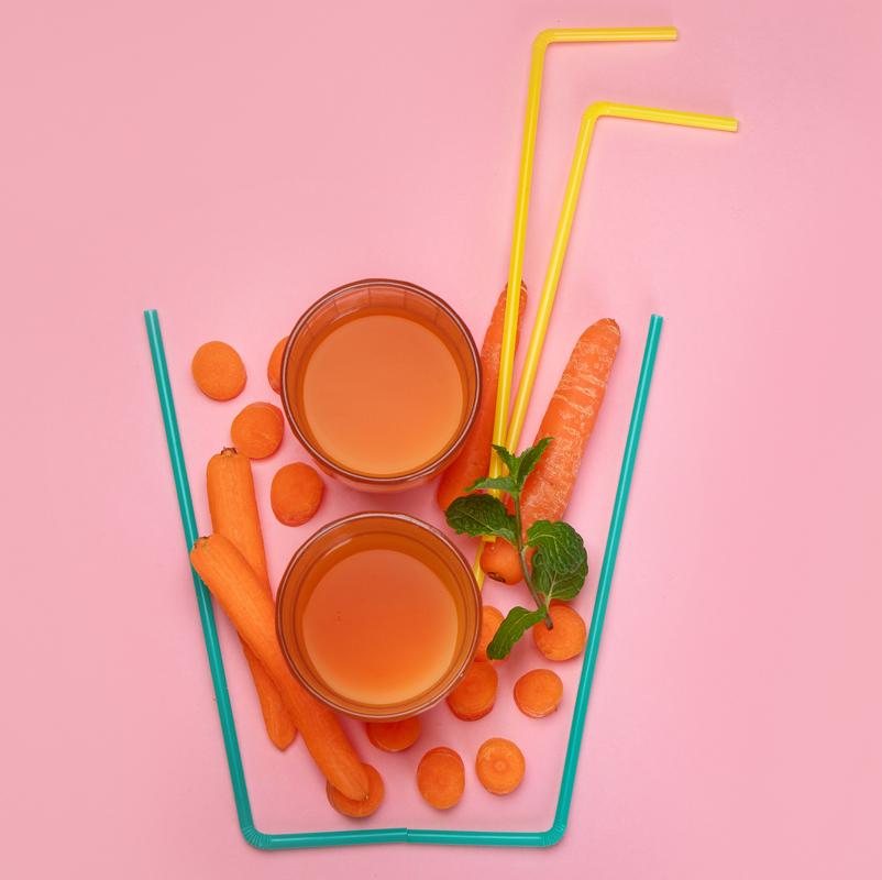 Verduras que hacen la forma de un vaso de zumo